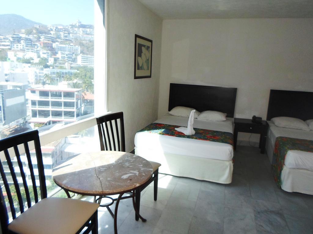 El Presidente Acapulco Hotel Стая снимка