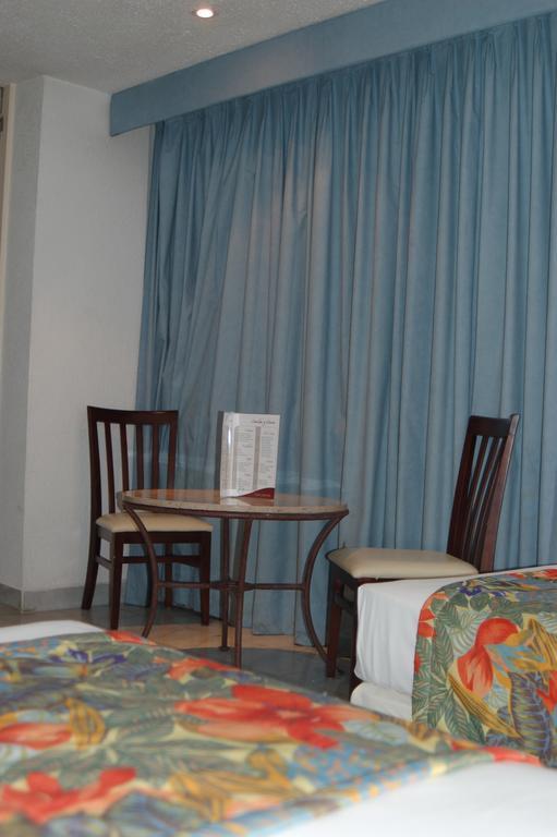 El Presidente Acapulco Hotel Стая снимка